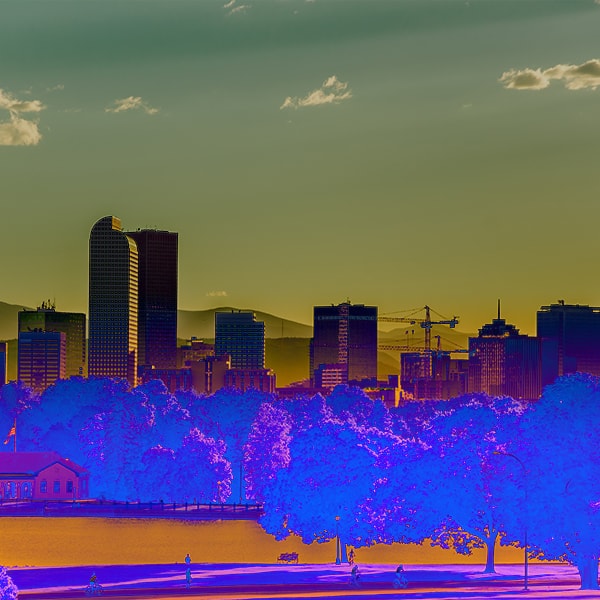 Denver electronic dance music; Denver skyline photo with psychadelic filter.