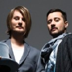 Röyksopp EDM Duo (headshot of both performers in grey / black attire)