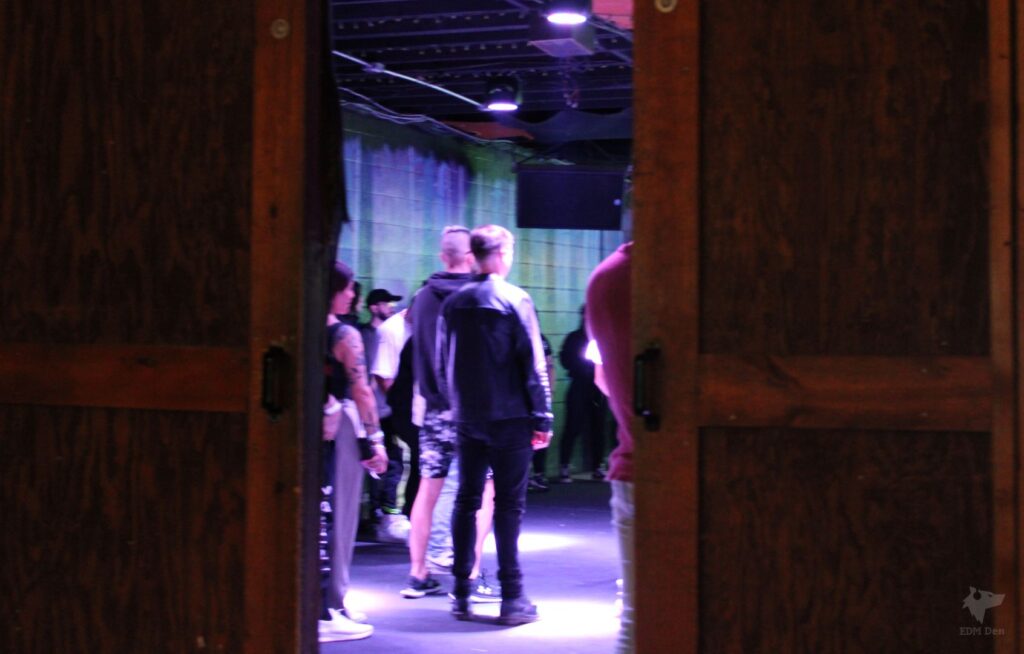 Peering in the open door at Larimer Lounge during Open Door Sessions Denver EDM event.