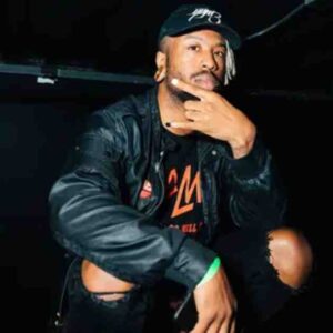 Tickets to Sweettooth EDM set (photo of artist in leather jacket).